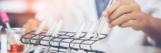 laboratory technician working with test tubes