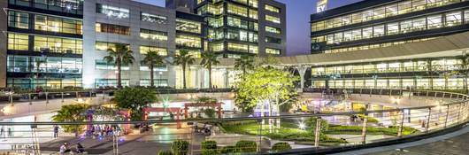 Exterior of an office building complex at twilight