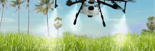 Agribot drone flying low over a field
