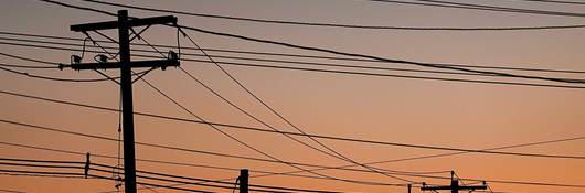 Electric poles at sunset.
