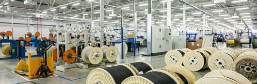 Rolled cable displayed on cable manufacturing floor