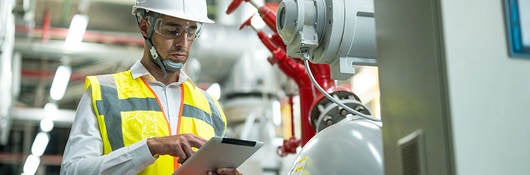 Engineer looking at a tablet