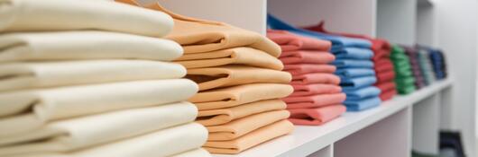 Colorful shirts at store.