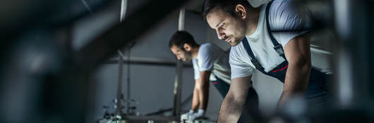 Two people working with lithium batteries