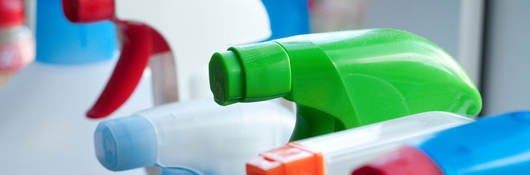 close-up of spray bottles in kitchen