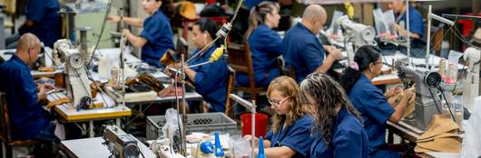 Laborers working at a textile factory.