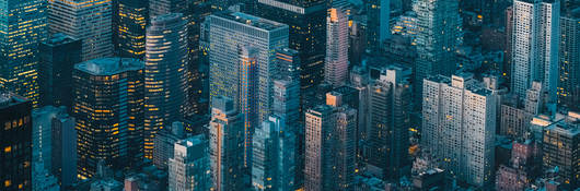 an aerial view of a city at night