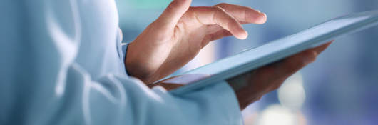 Doctor holding a tablet