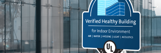 Verified Healthy Building Mark on Modern Glass Building