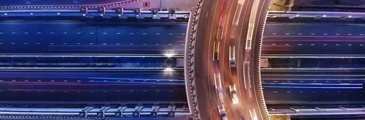 Aerial view of circular road traffic at night