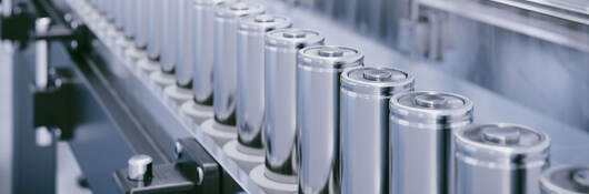A row of lithium-ion batteries in a manufacturing plant