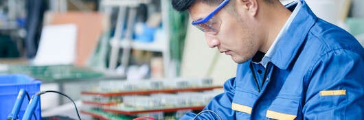 Repairman checking voltage