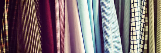 Several colorful jackets hanging together