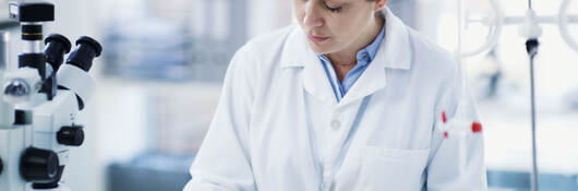 A chemist at work in a laboratory