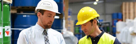 Two workers in hard hats