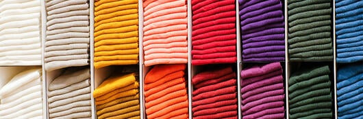 Stacks of colorful clothing
