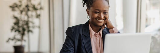 A person listening to a webinar