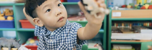 A child playing with toys