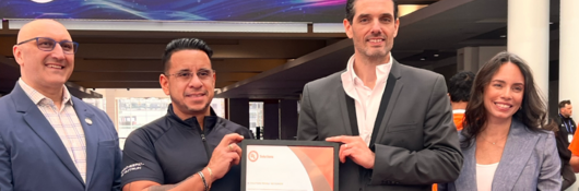 Group holding a certificate at Data Center World 2026