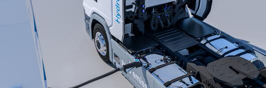Commercial vehicle at hydrogen fueling station.