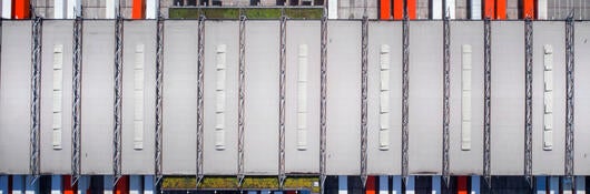 Aerial view of distribution logistics building parking lot.