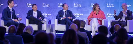 Alex Dadakis, EVP and president of Testing, Inspection and Certification (TIC) at UL Solutions (left), moderates a July 22 discussion at the Global Quantum Forum. (Photo credit: David T. Kindler).