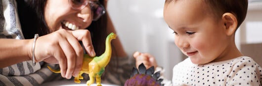 mom son playing with toy