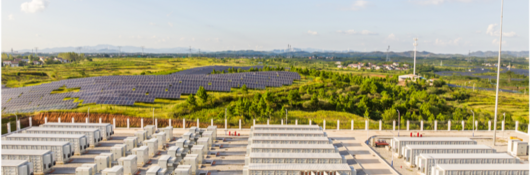 Outside modular data center in front of a solar array