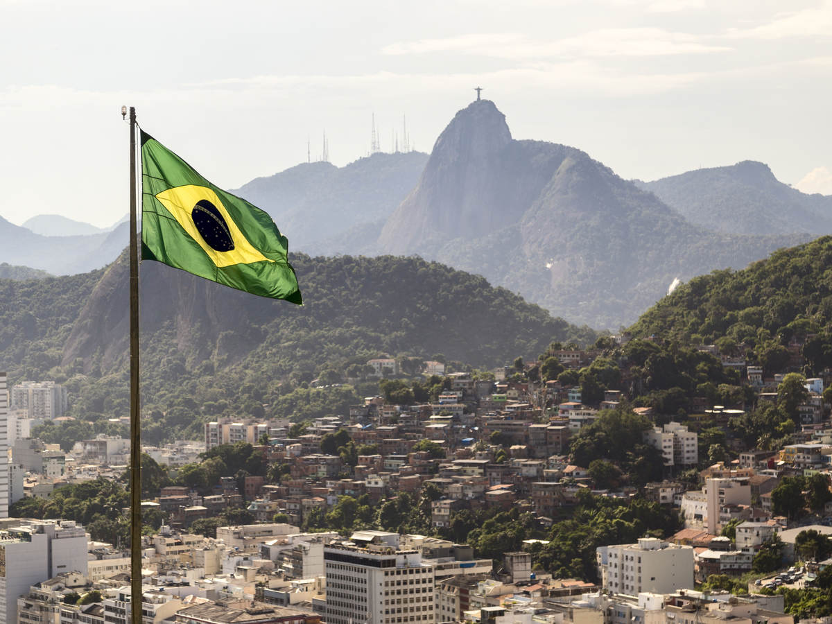 View of Brazil and waving Brazilian flag	