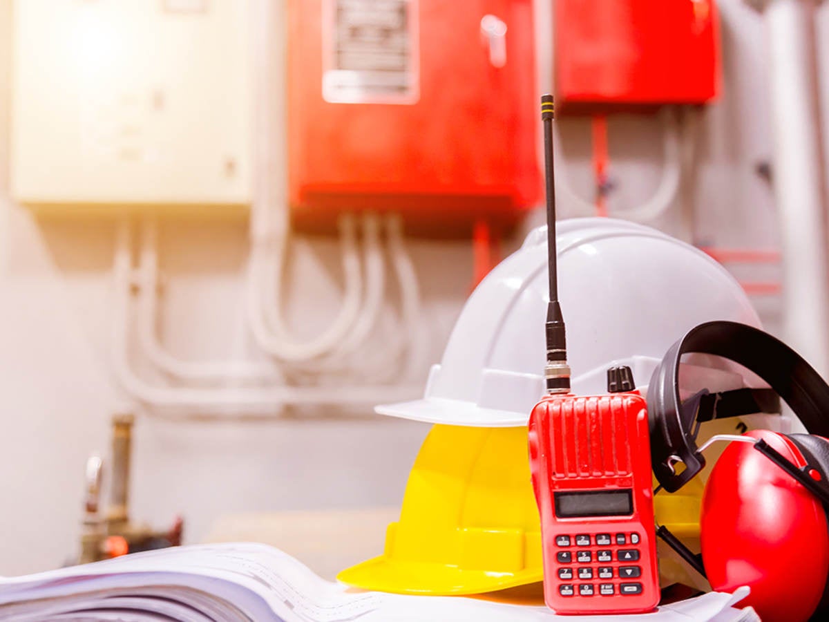 Standard construction safety equipment in a control room.