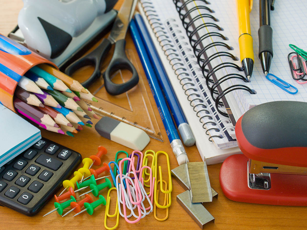 Assorted office supplies, notebooks, pencils