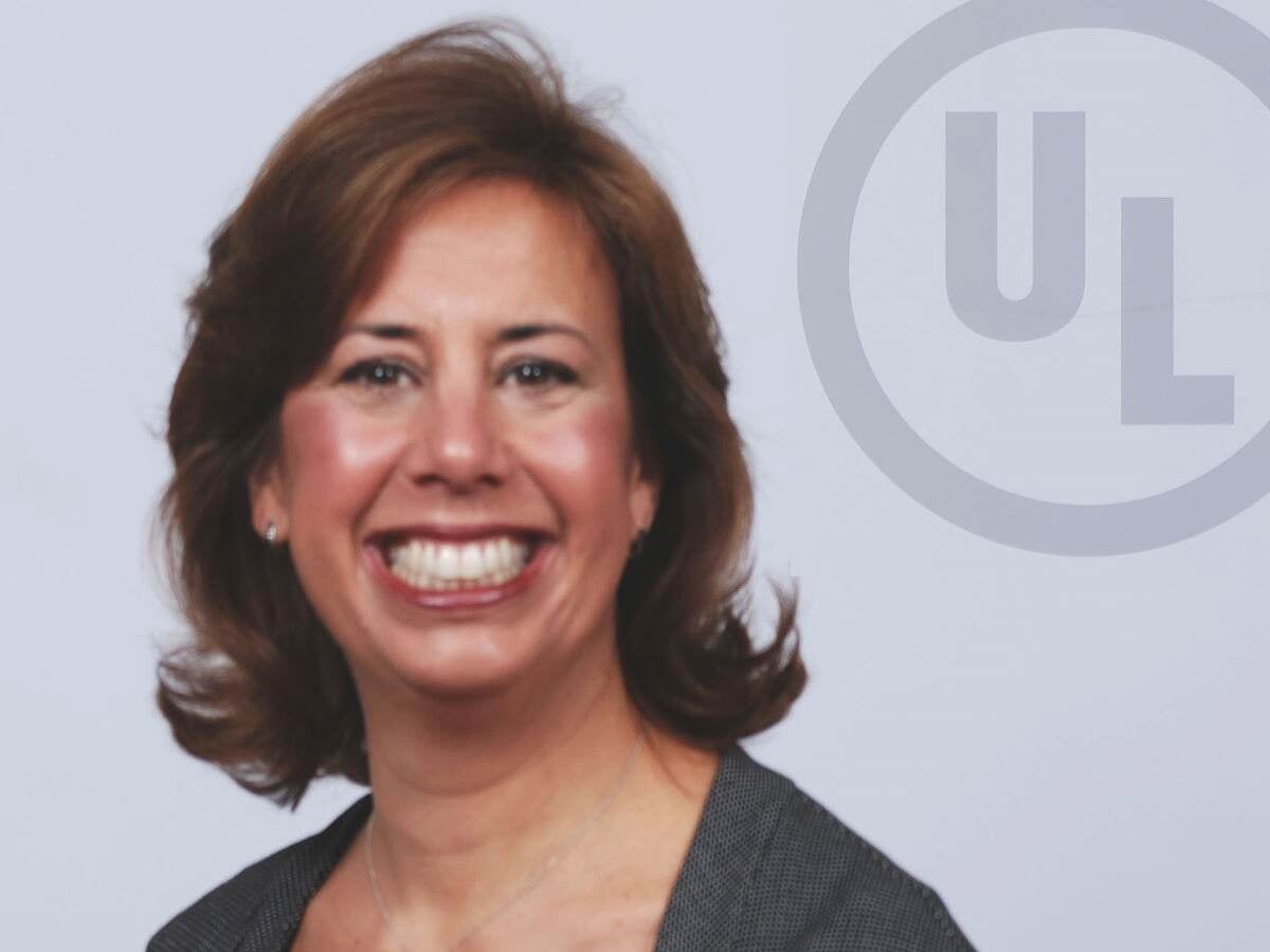 Professional image of Barb Guthrie with the UL logo in the background.