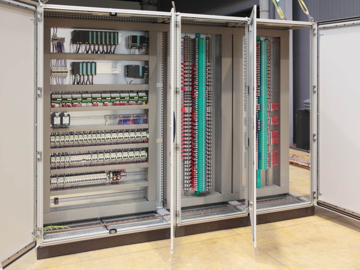 The inside of an industrial control panel board.