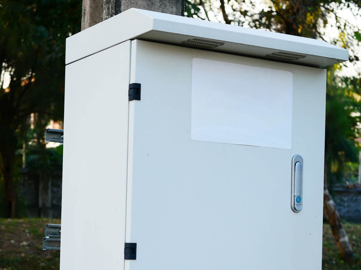 White junction box on post