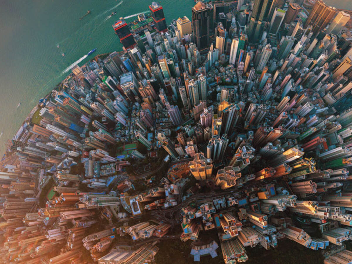 Aerial view of city with tall buildings