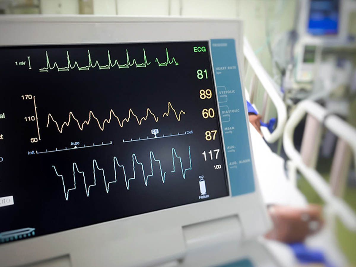 Close-up of an electrocardiogram monitor in a hospital room