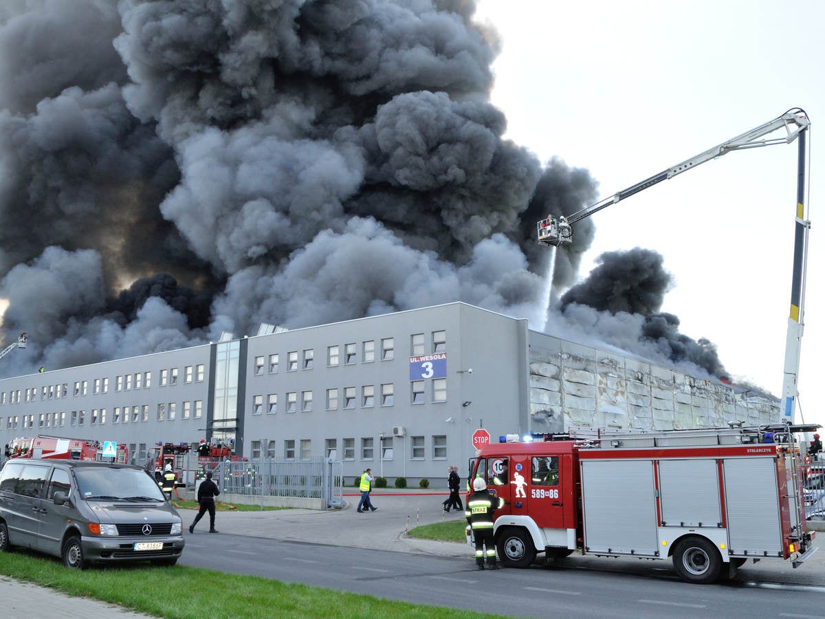 firefighter crews battling storehouse fire