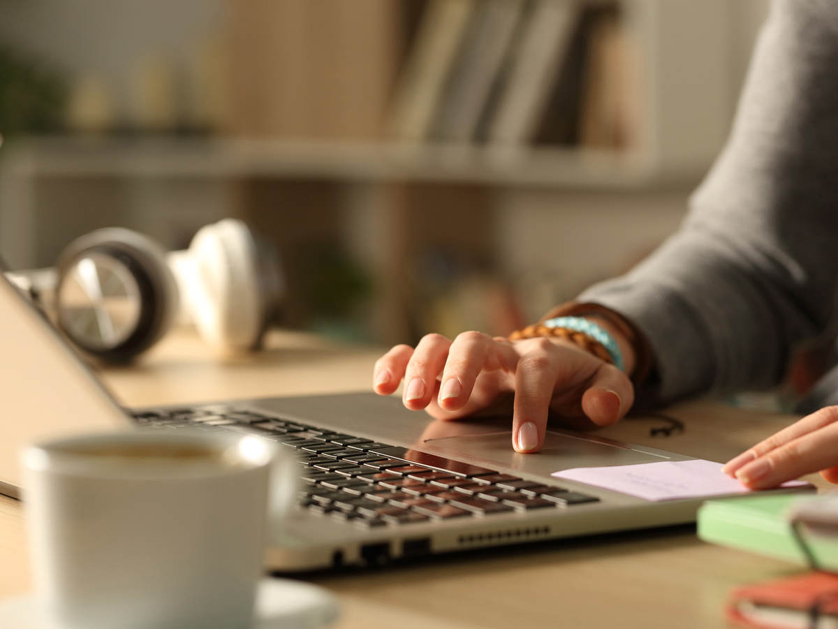 A person using a laptop computer