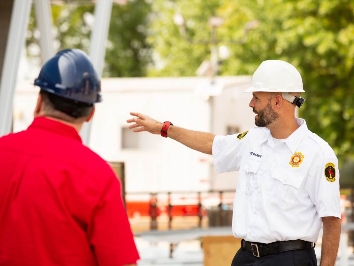 Two code authorities talking outdoors