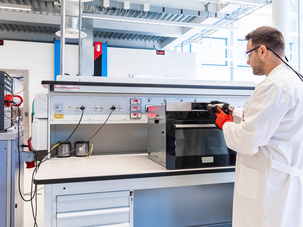 Lab technician testing a medical device.