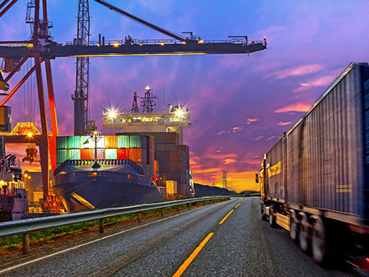 Truck transporting container on the road