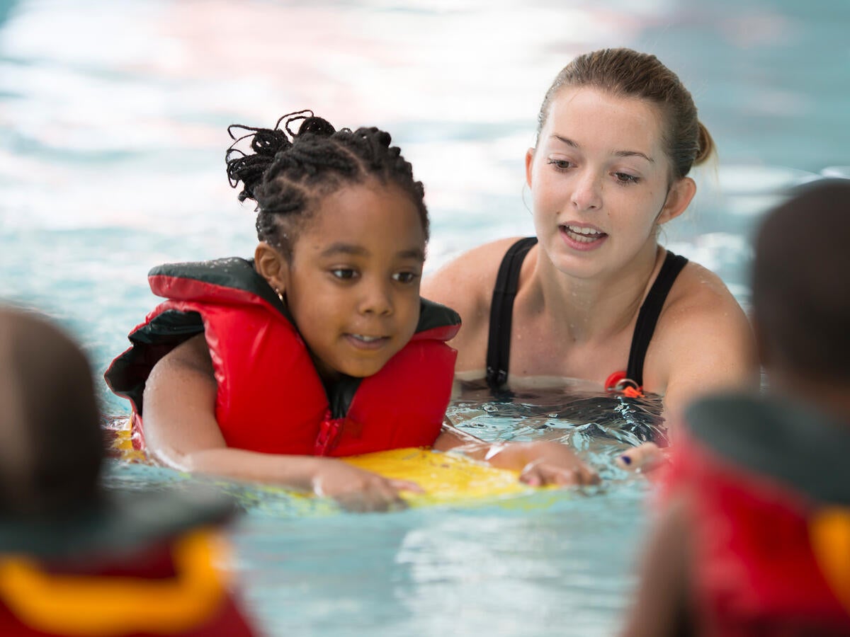 Children playing in swimming pool