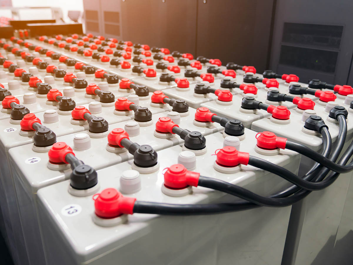 Rows of battery packs in industrial backup power system