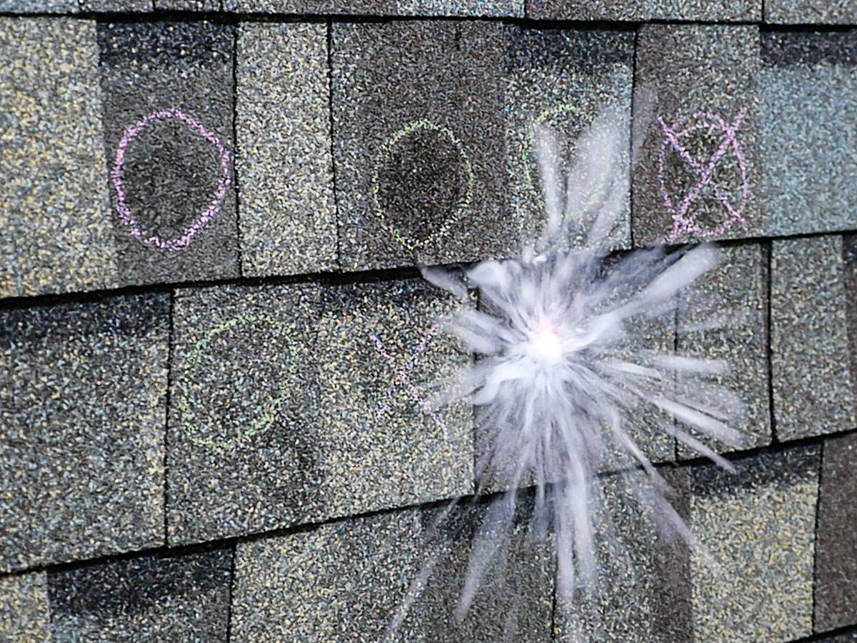 Close up of hail impact testing on shingles