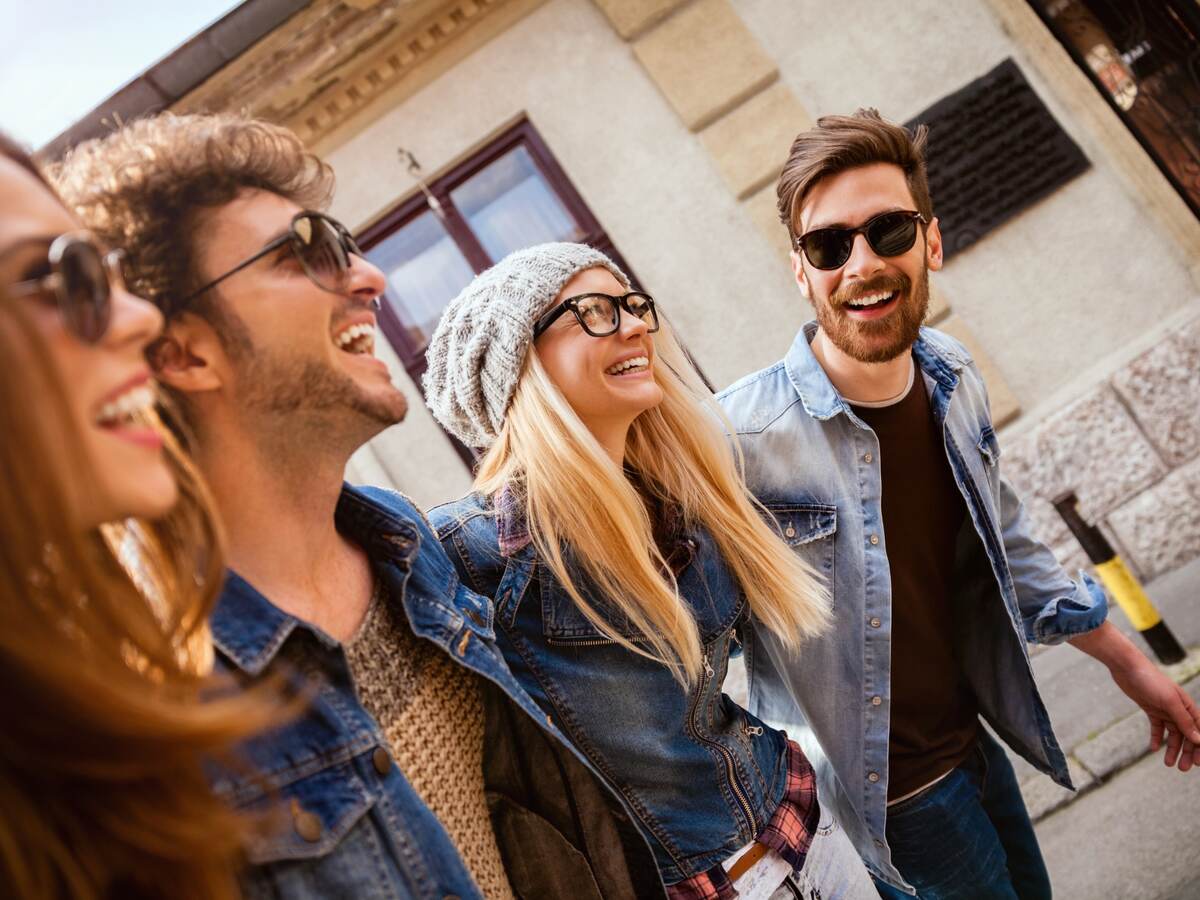 Friends out for a walk wearing glasses and sunglasses