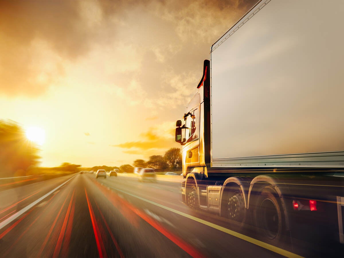 Truck traffic transport on highway in motion