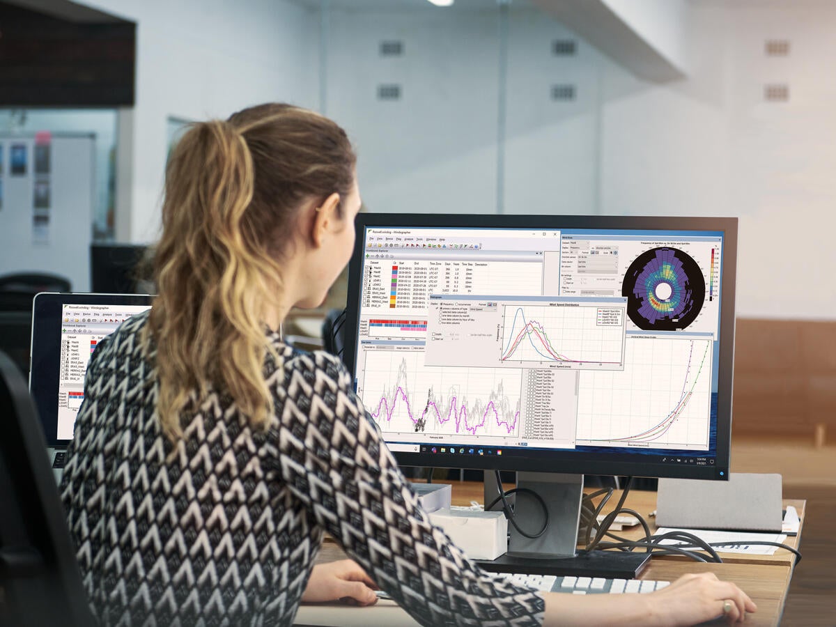 Person reviewing Windographer software on a computer