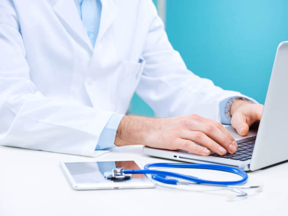 A doctor working on computer