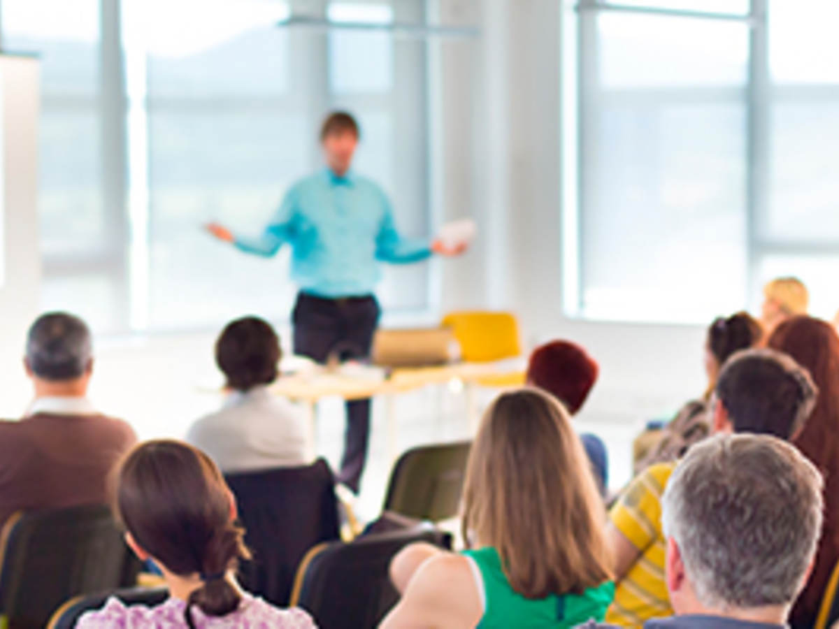 People listening to a presentation