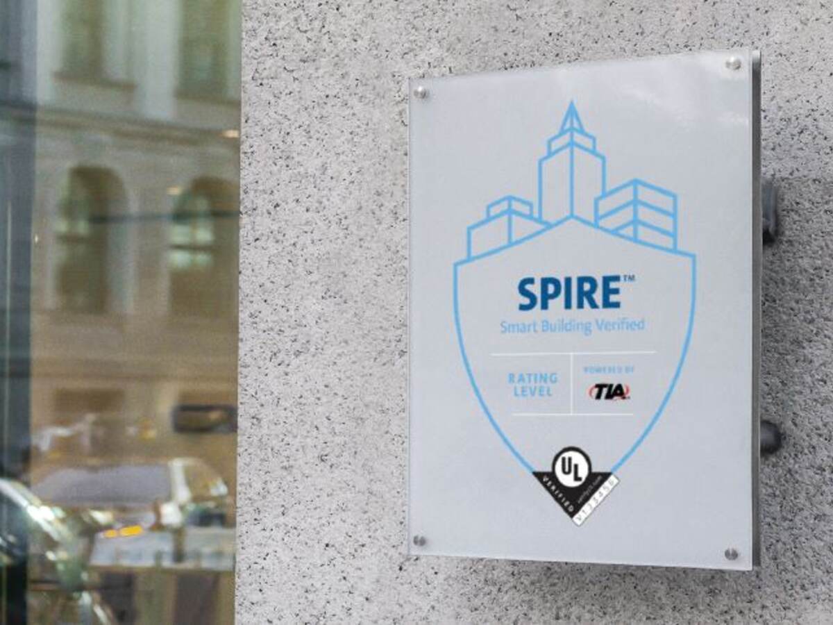 SPIRE Smart Building Verified Assessment plague at eye level on modern building
